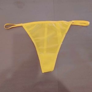 Urban Outfitters Out From Under   yellow thong size medium never worn